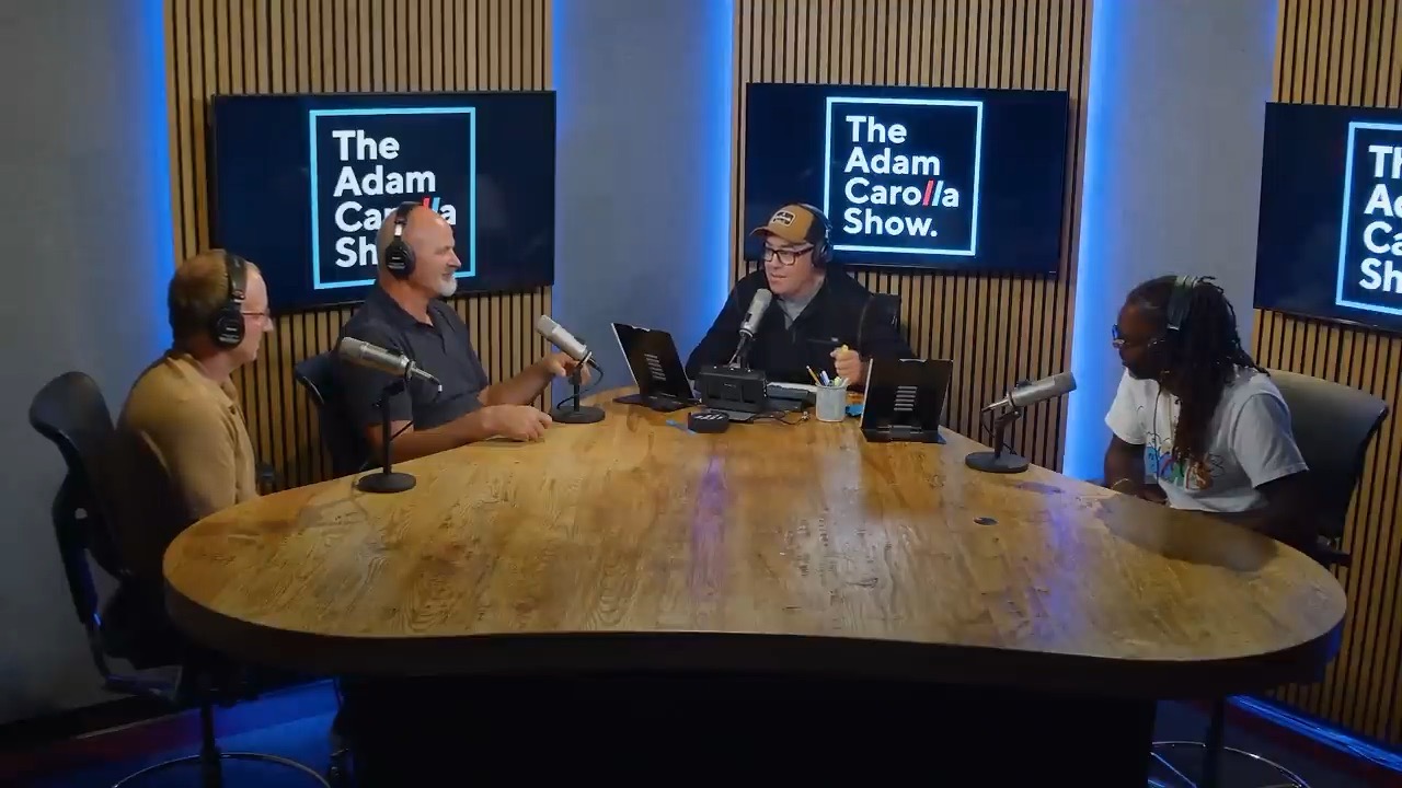 Filmmakers around the table in The Adam Carolla Show studio