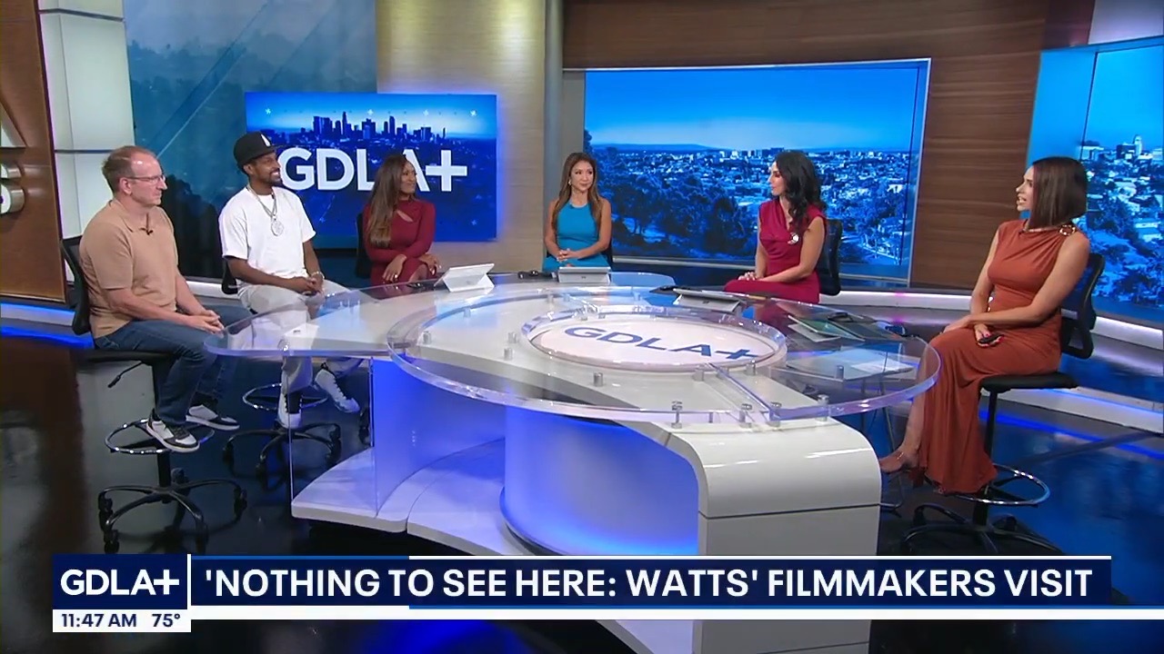 The FOX 11 Good Day LA studio desk, filmmakers seated with the anchors