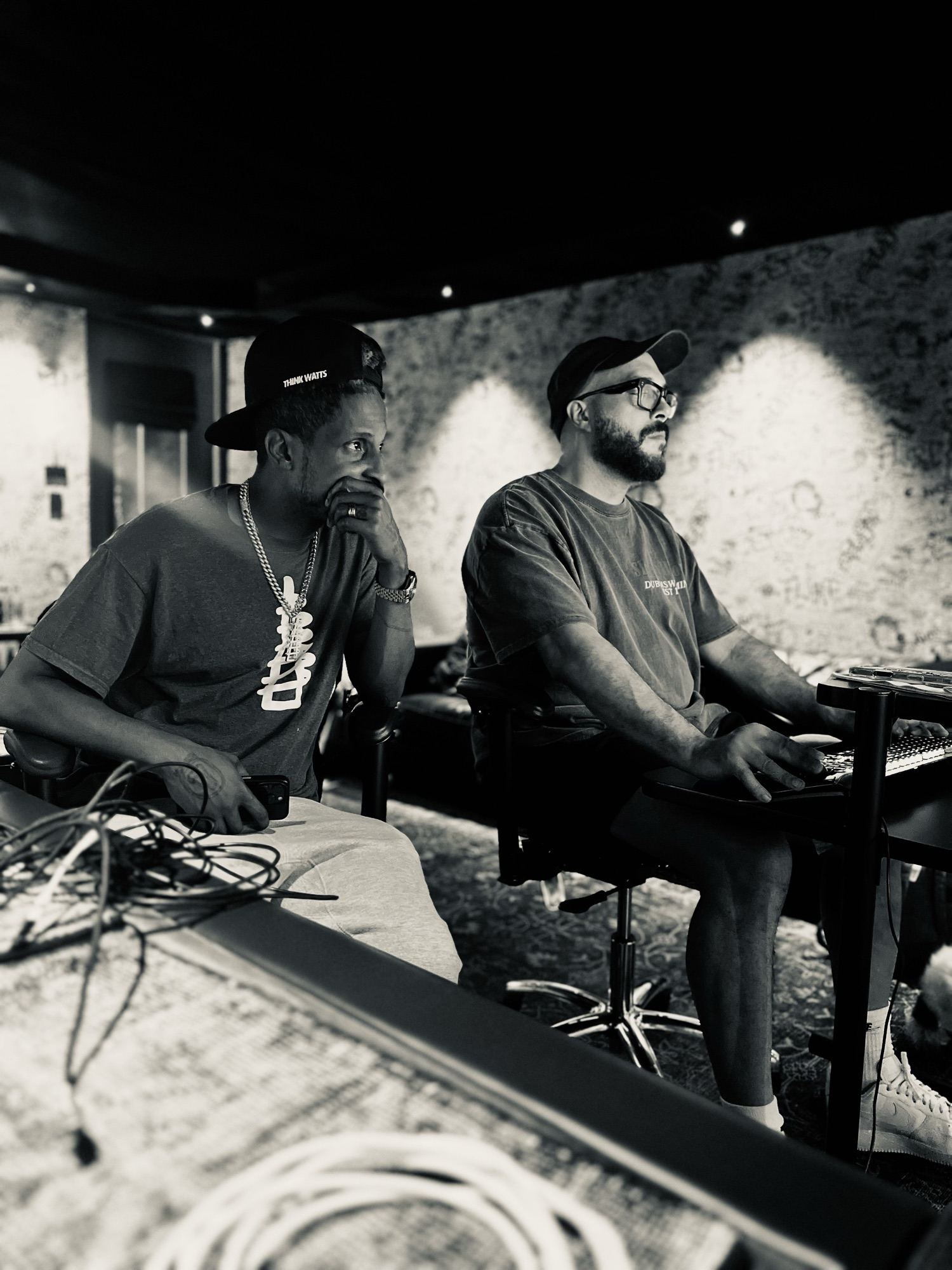 Two of the score team at the console during the sessions